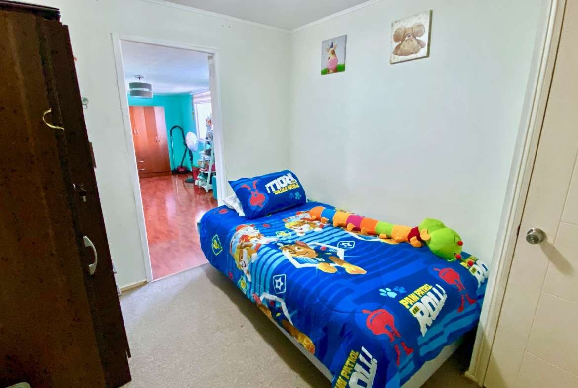 Dormitorio secundario con acceso a ampliación